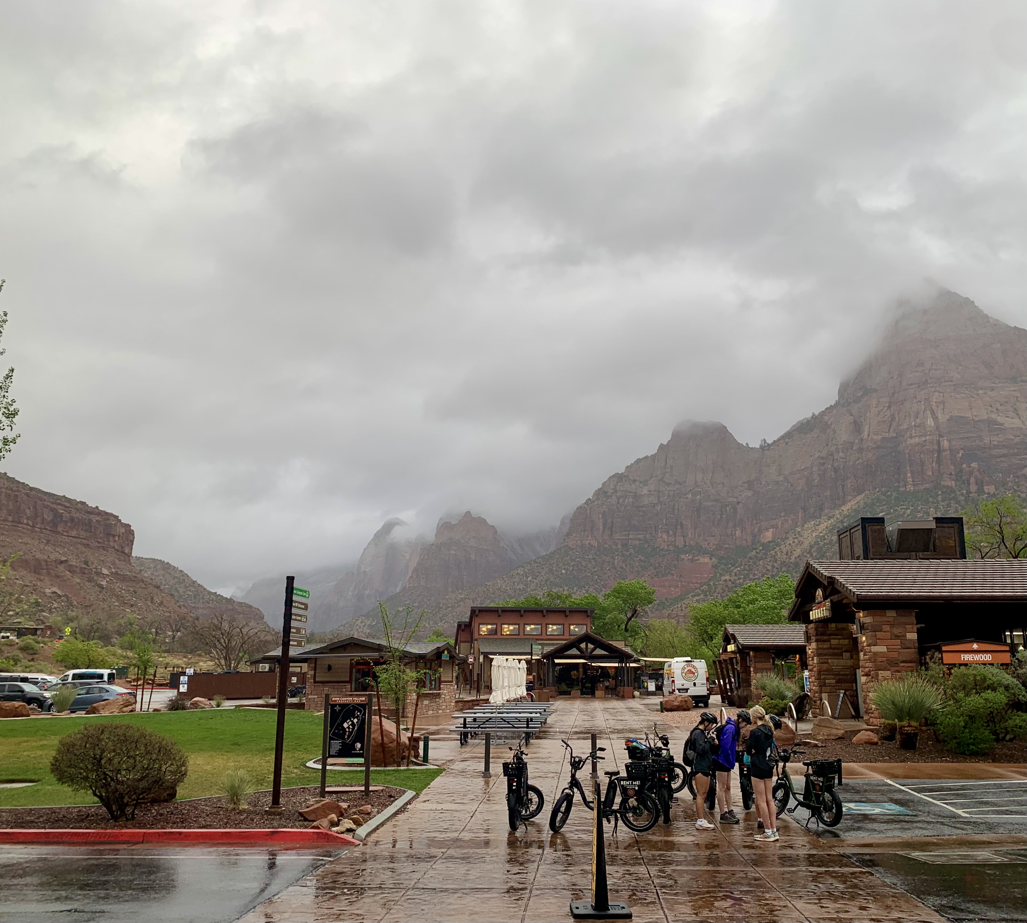 Rainy day at Zion National Park visitor center with storm clouds rolling through the canyon